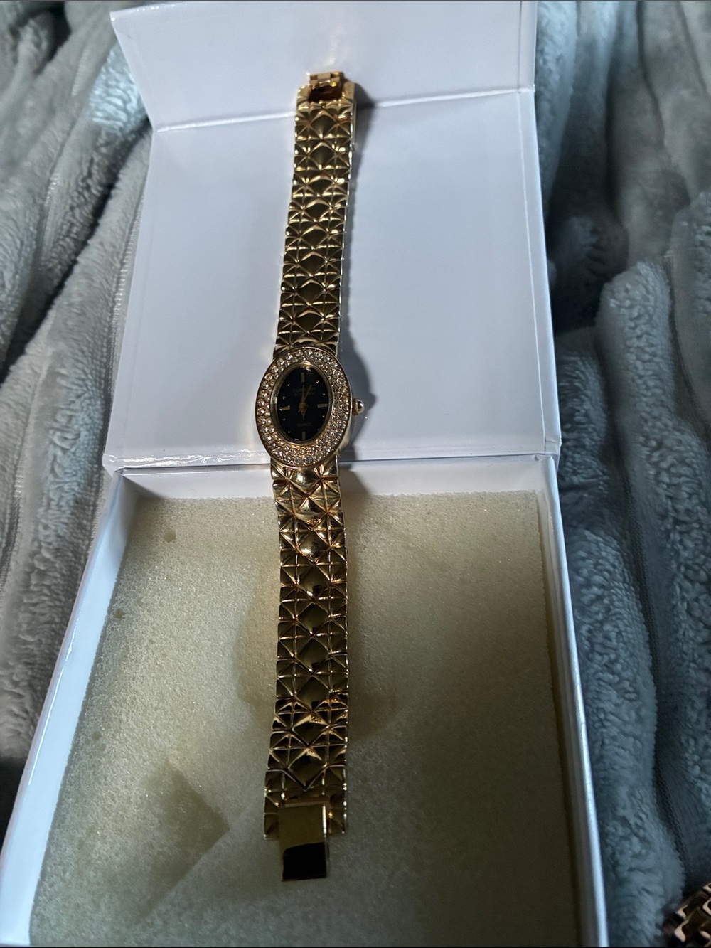 Gold Tone Women's Oval Watch with Black Dial